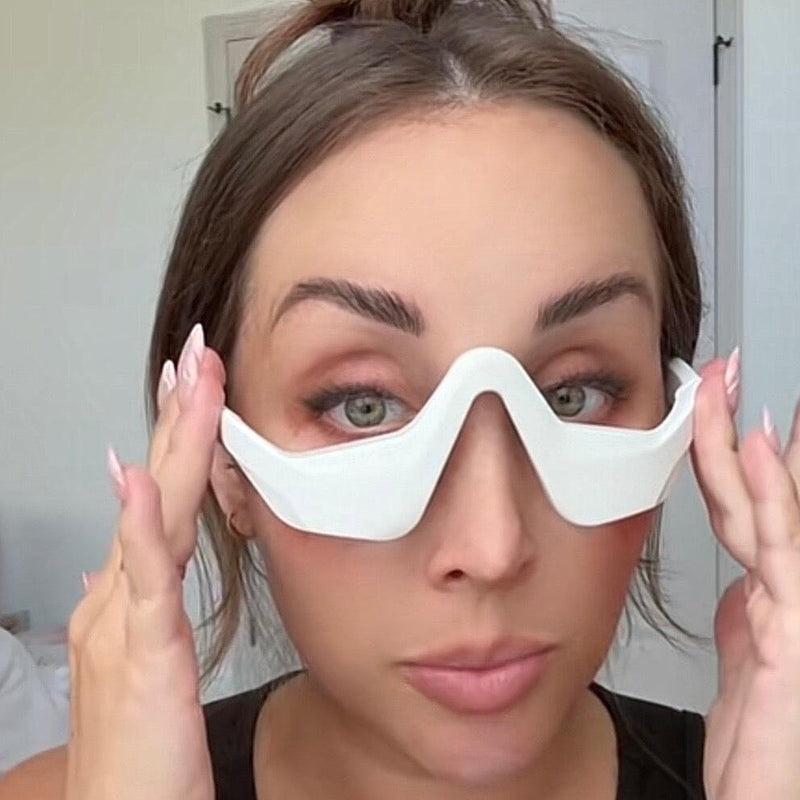 Customer trying on the 3D Eye Massager