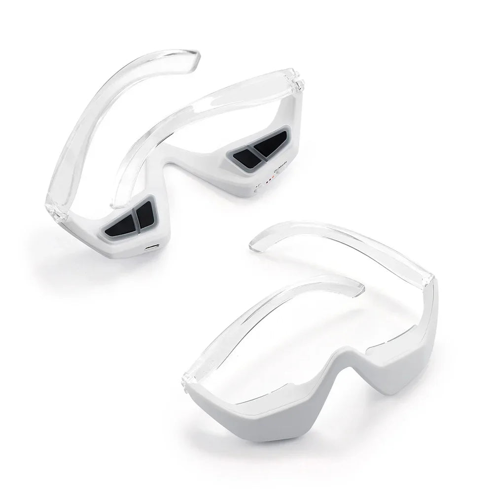 Close-up of the foldable 3D eye massager frame in clear/white design