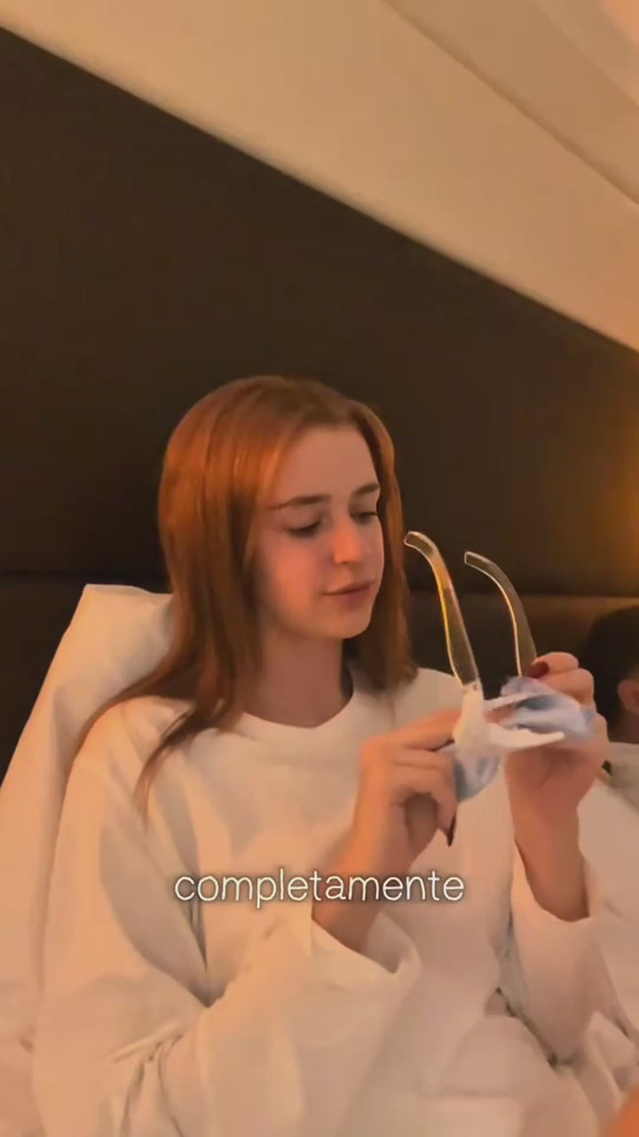 Woman using the 3D eye massager